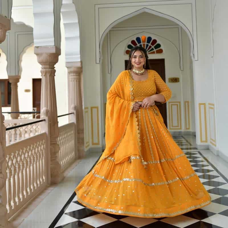 7 – Yellow Lehenga Embellished With Foil Mirrors And Golden Thread