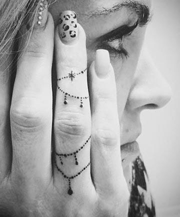 ↓ 37. Ring Tattoos